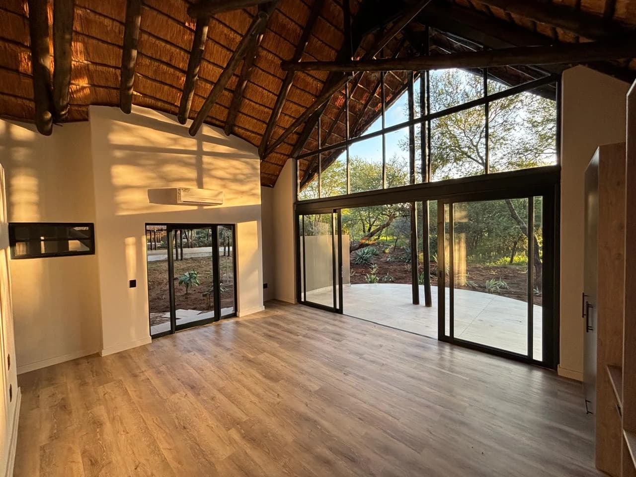 Black Rhino — living space beneath the exposed roof structure