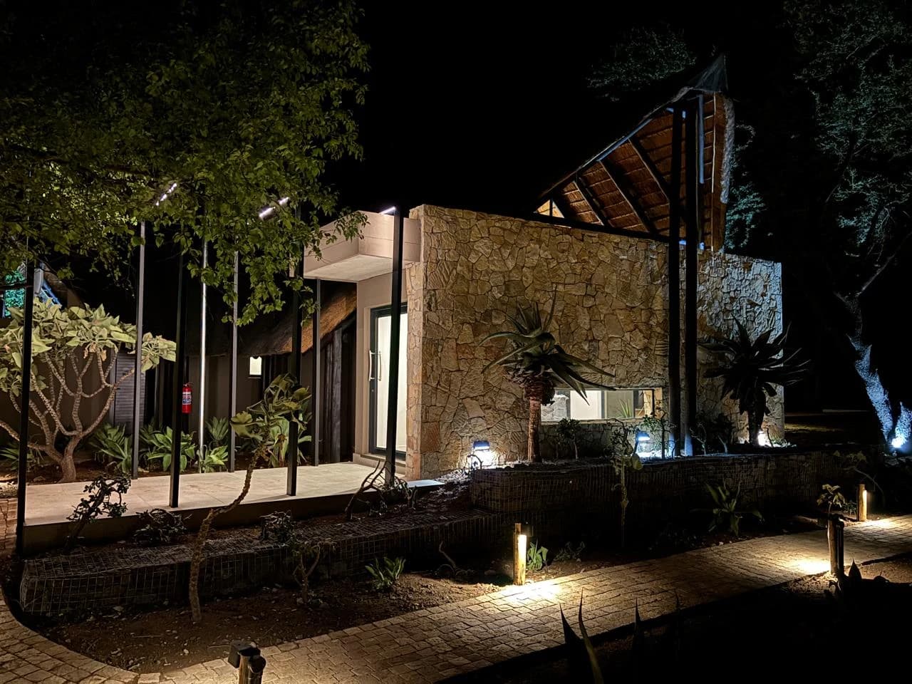Black Rhino — exterior lighting after dark